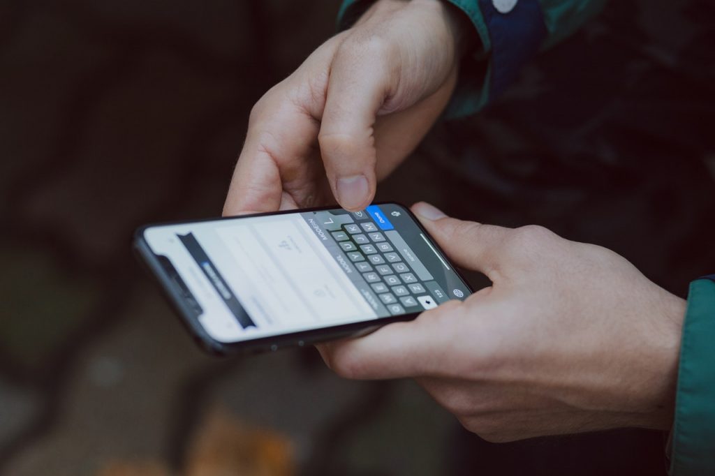 a person holding a calculator