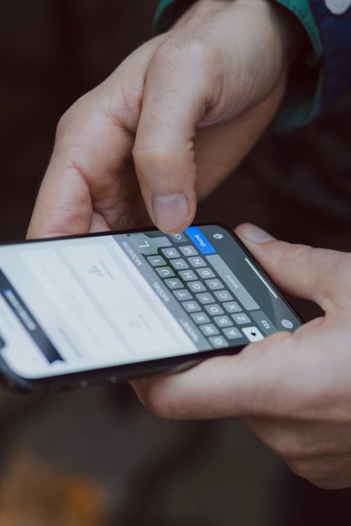 a person holding a calculator