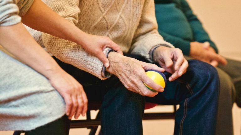 a person holding a lemon