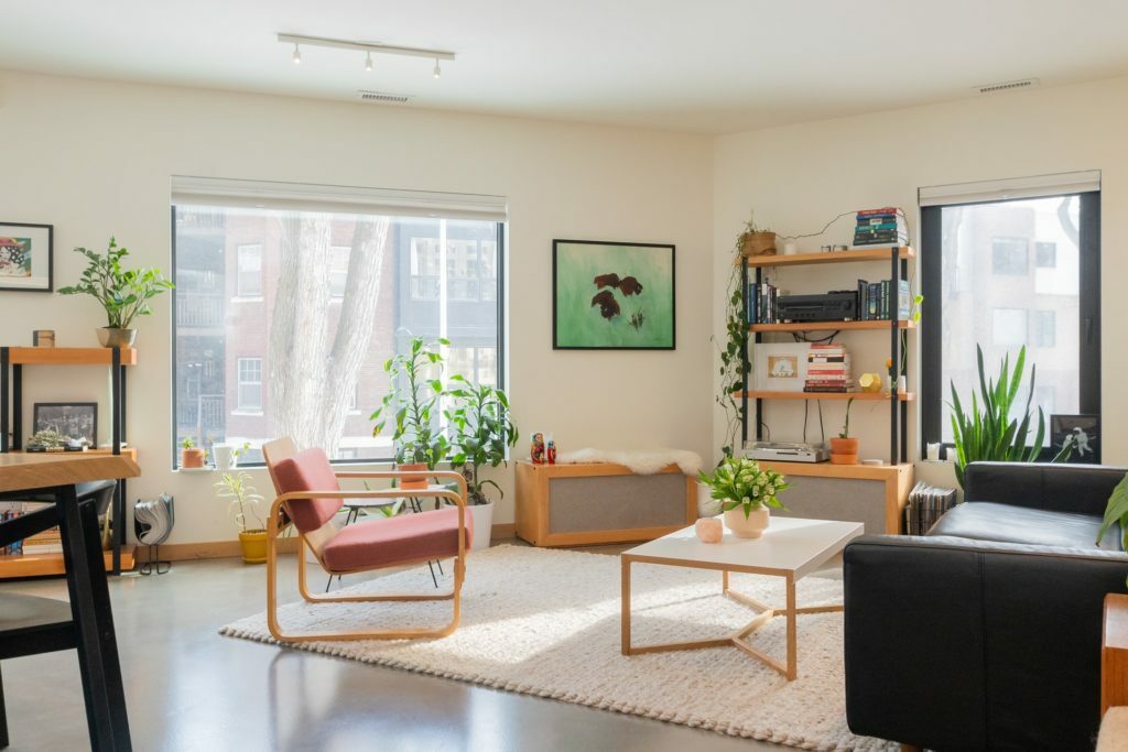 a living room with a couch and a table