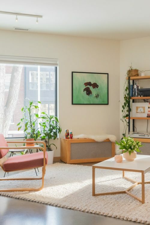 a living room with a couch and a table