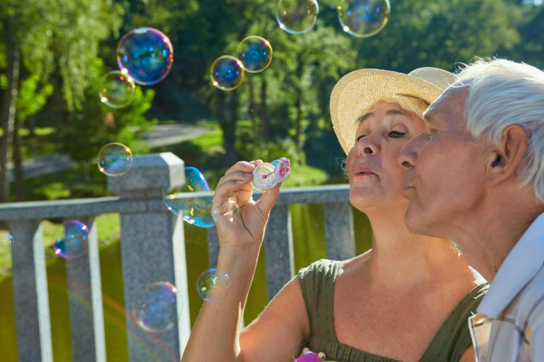 a person drinking from a glass